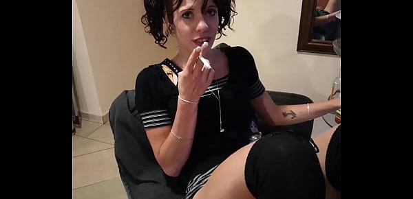  Skinny girl smoking while showing off her pussy